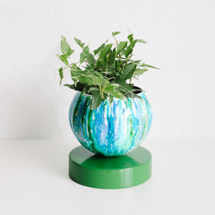 blue and green watercolor planter with ivy plant