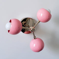 light pink and chrome midcentury modern lighting chandelier nursery or playroom decor