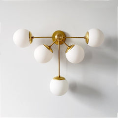 Brass Art Deco inspired oversized modern wall sconce