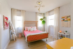 Pink and yellow colorful childrens' bedroom decor with a Cabildo Chandelier