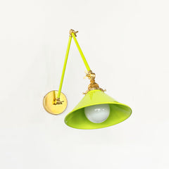 Neon Chartreuse and Brass Adjustable Cone sconce for above open concept shelving in a kitchen