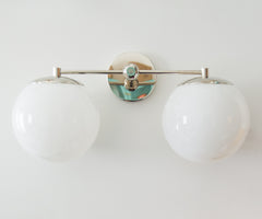 chrome mid century modern two light vanity light