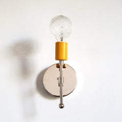 chrome and mustard modern wall lighting sconce colorful interior design