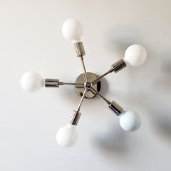 Chrome five light sconce or flushmount ceiling fixture with mid century modern design