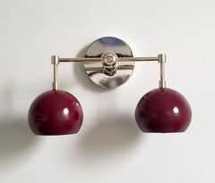 Chrome and Black Cherry two light wall sconce with eyeball globe shades
