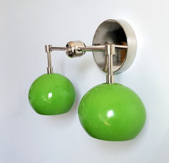 modern wall sconce in greenery
