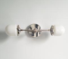 chrome and white bathroom wall sconce