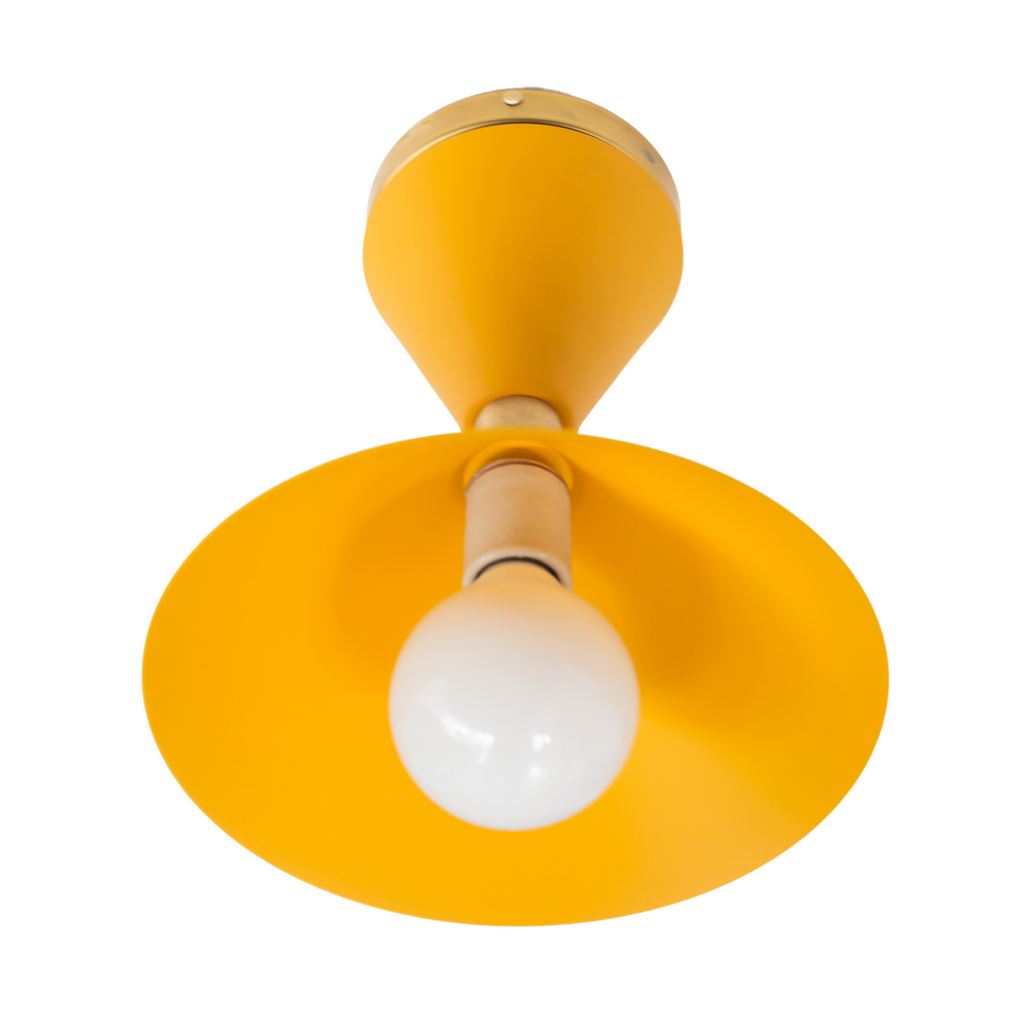 Mustard & Brass flushmount ceiling light in a mid-century modern style shape