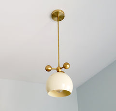 cream and brass modern globe pendant chandelier with brass orb ball details midcentury inspired