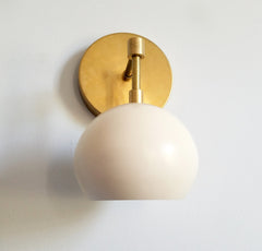 one light wall sconce brass and cream lighting