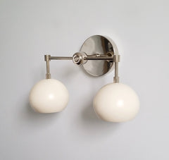 cream and chrome modern bathroom sconce