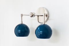 Chrome and grey blue two light mid century modern wall sconce - side view