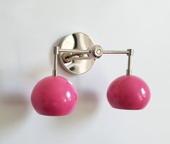 Bright pink and chrome two-light wall sconce