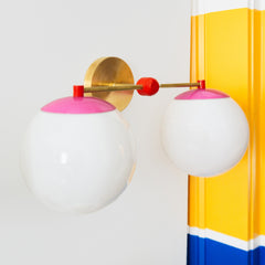 pink and poppy red two light wall sconce for bathrooms