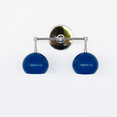 Chrome and blue mid century modern inspired bathroom wall sconce with two sockets