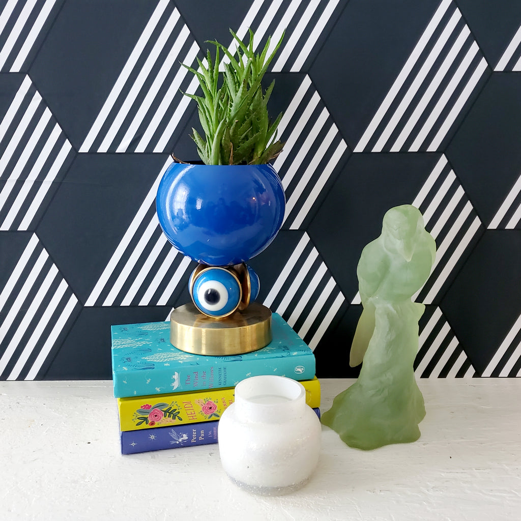 Blue and brass evil eye planter by Sazerac Stitches