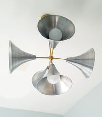 The Gormley Chandelier loft farmhouse inspired large stadium megaphone chandelier with cone shades mid century art deco modern industrial with brass accents steel aluminum finish