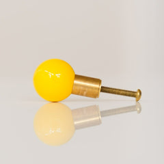 Yellow & Brass cabinet drawer pull made by sazerac stitches