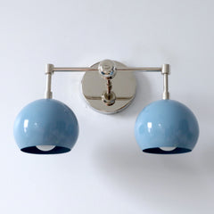 mid century modern vanity sconce in chrome and light blue
