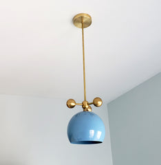 baby blue and brass modern globe pendant with brass orb ball details midcentury inspired