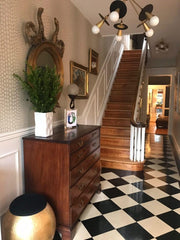 modern chandelier mixed with victorian antiques and home decor