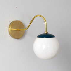 Lagoon and Brass curved arm wall sconce for midcentury modern style bathrooms