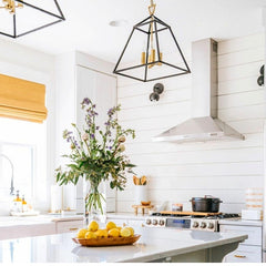 Farmhouse Modern kitchen with black sconces by Sazerac Stitches