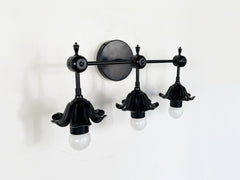 Octavia Three Light Sconce