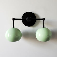 Mint and matte black two light mid century modern wall sconce light
