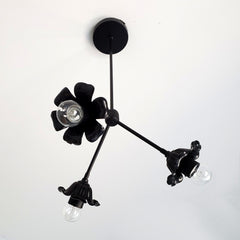 Matte black modern victorian chandelier with floral details