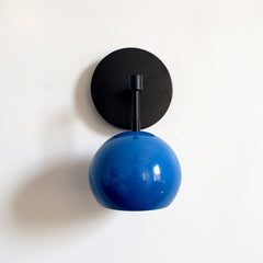 Mediterranean Blue and Matte Black wall sconce with modern MCM eyeball shade by Sazerac Stitches