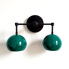 matte black and mermaid green two light wall sconce bathroom lighting