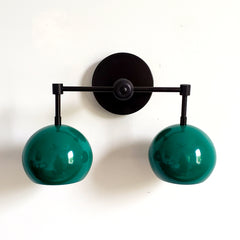 matte black and mermaid green two light wall sconce bathroom lighting