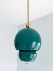Dark green and brass nesting pendant light atomic style midcentury modern inspired single pendant lighting