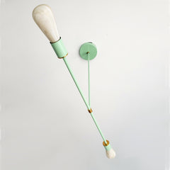 Mint chandelier with brass accents for narrow dining room tables
