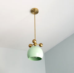 vintage mint and brass modern globe pendant with brass orb ball details midcentury inspired