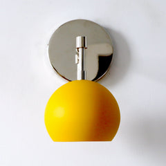 chrome and mustard midcentury modern sconce by Sazerac Stitches