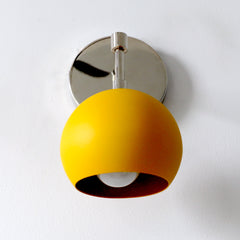 chrome and mustard midcentury modern sconce by Sazerac Stitches