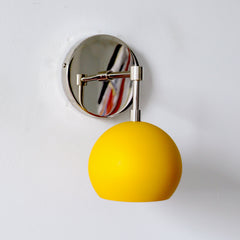 chrome and mustard midcentury modern sconce by Sazerac Stitches