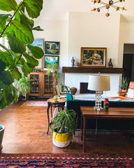 Boho style living room with a floral sputnik style chandelier