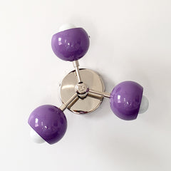 purple and chrome midcentury modern lighting chandelier nursery or playroom decor