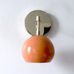 Chrome and Peach mid century modern wall sconce with eyeball globe shade