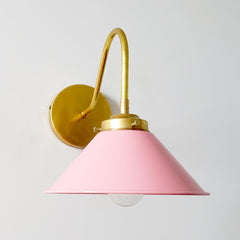 pink and brass farmhouse modern sconce in fun light pink color and brass.  Great kids room or nursery lighting decor idea.