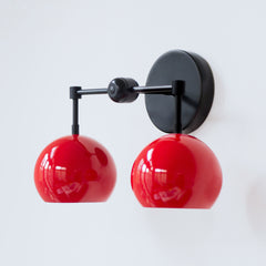 red and black two light mid century modern wall sconce