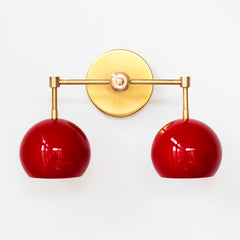 Red and Brass Mid Century Modern two light wall sconce