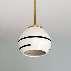 Earthy modern organic ceramic pendant lighting inspired by inlaid terrazzo close up