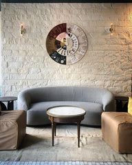 White and brass constance sconces in a New Orleans wine bar