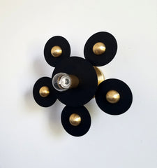 black and brass modern geometric circle sconce or flusmount fixture