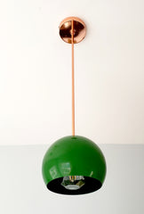 polished Copper and spring green mid century modern inspired pendant lighting with a large colored globe shade