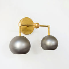 brass and steel bathroom vanity light